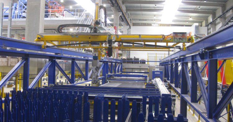 Cost Factors - Interior view of precast concrete plant - shuttering robot  Cost Factors - Interior view of precast concrete plant - shuttering robot